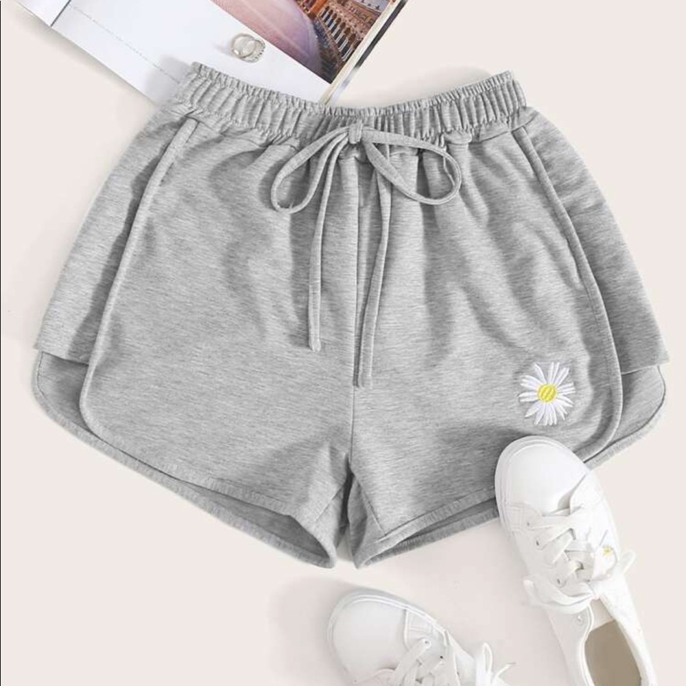 SHEIN Light gray shorts with flower at bottom